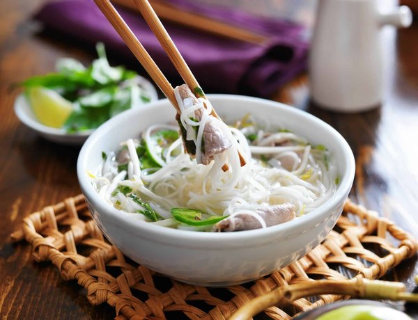 How to Prepare a Gourmet Asian Noodle Bowl with Handmade Noodles and Broth?